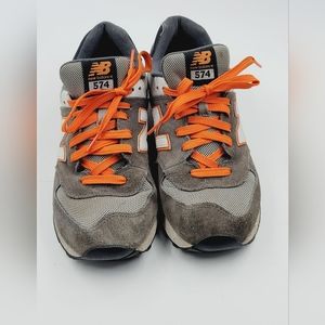 Men's new balance 574 Size 9 D Is orange and gray